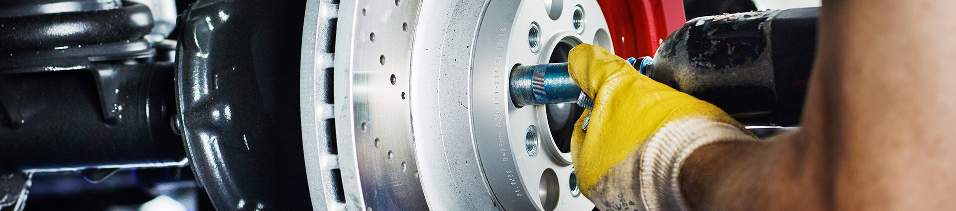 Technician demonstrating how to perform a brake change in Las Vegas, NV